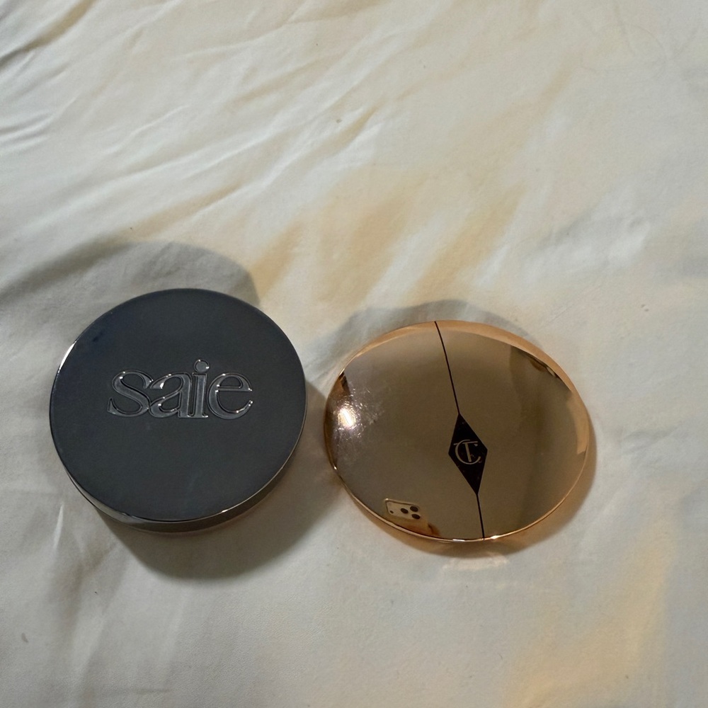 Saie loose powder translucent and charlotte tilbury pressed powder fair